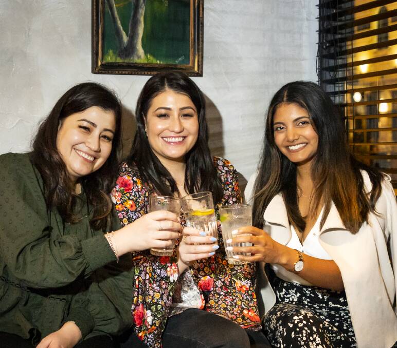 Gowrie and Natalie Dandagi share a drink with Danielle Rooney at Blacksmith Bar in Swan St