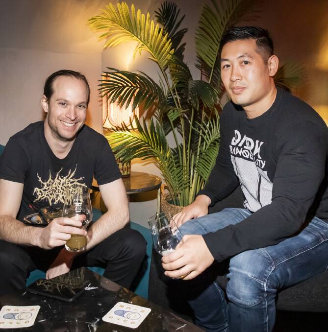 Sam Sutton and Kevin Leong take time out at the Nice Guys Brewery and Bar in Victoria St